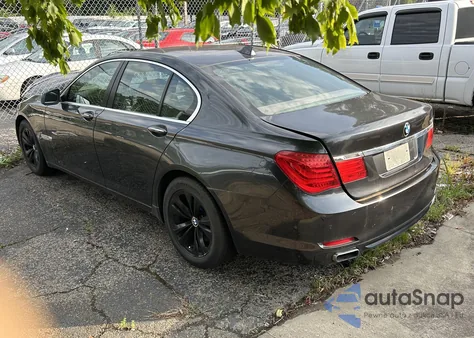 2011 BMW 740I из США, поврежденный, VIN WBAKA4C59BC392172